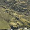 Oblique aerial view centred on the remains of the township and potato damps, taken from the WNW.