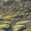 Oblique aerial view centred on the remains of the township and potato damps, taken from the NNW.