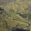 General oblique aerial view centred on the lodge and the remains of the township, taken from the E.