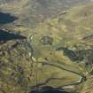 General oblique aerial view centred on the lodge and the remains of the township, taken from the E.