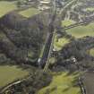 Oblique aerial view centred on Newbattle railway viaduct, taken from the NW.