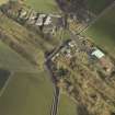 Oblique aerial view centred on railway station, taken from the SW.