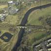 Oblique aerial view centred on Redbridge railway viaduct, taken from the S.