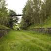 View.  From SE looking from S entrance to tunnel mouth to farm access bridge.