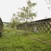 View.  From S showing lattice girder bridge.