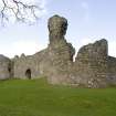 View.  From E showing S curtain wall, S entrance and SW, SE towers.