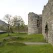 Detail.  From NE showing S entrance, curtain wall and SW tower.