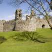 View.  From NW showing SW tower, ditch and arched entrance.