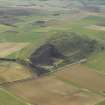 Oblique aerial view centred on the remains of the fort, taken from the NNE.