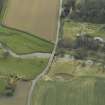 Oblique aerial view centred on the road bridge, taken from the NW.