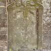 Detail of gravestone built into church wall