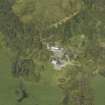 Oblique aerial view centred on the country house and formal garden, taken from the SSE.
