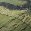 Oblique aerial view centred on the remains of the fort, taken from the N.