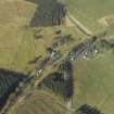 Oblique aerial view centred on Steele Road station and road overbridge, taken from the SE.