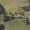 Oblique aerial view centred on Steele Road station and road overbridge, taken from the E.