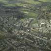 General oblique aerial view centred on the central area of the town , taken from the SW.