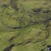 Oblique aerial view centred on the remains of the township and field-system, taken from the E.