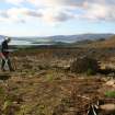 Ian Parker undertaking a plane table survey of the chambered cairn. View looking SW to Loch Lomond.