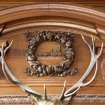 Interior. Detail of carving above fireplace in boardroom on first floor.