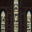 Interior. View of stained glass window at Liturgical W end by Charles E Kempe