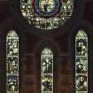 Interior. Chancel. View of stained glass window by C E Kempe c.1898 Christ enthroned and scenes from his life.