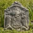 View of gravestone with coat of arms