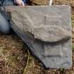 Fragment of west highland grave slab - head of effigy resting on pillow