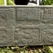 Fragment of west highland grave slab showing galley, sword hilt and decoration