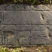 Fragment of west highland grave slab with sword and shears (flash)