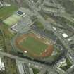 Oblique aerial view centred on Meadowbank Stadium., taken from the NW