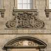 Detail of coat of arms above doorway on NW facade