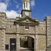 Clocktower and entrance to S courtyard, view from SW