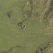 Oblique aerial view centred on the chapel and burial ground, taken from the WSW.