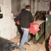 Interior. Main Building. 1st floor. Back Finishing. View of Glazing Machine used for flattening out the hide 'grain'.