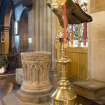 Interior. View of lectern and font