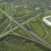 Oblique aerial view centred on the motorway interchange, taken from the S.