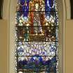 Interior. View of  N wall stained glass window by Gordon Webster 1958