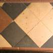 Interior. Detail of part of minton tile floor now covered by pews