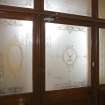 Interior. Ground  floor. Etched glass screen to entrance vestibule. Detail