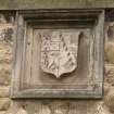 Detail of Coat of Arms armourial panel beneath Bell Turret and above entrance of Stable Block for William Edward Hope-Weir and his wife, fomerly Lady Mary Emily Boyle.