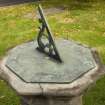 Detail of gnomon and brass plate on top of Western sundial, Craigiehall House, Edinburgh.