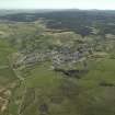 General oblique aerial view looking towards the village of Dalmellington, taken from the SW.
