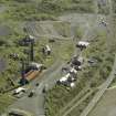 Oblique aerial view of the remains of the ironworks, taken from the WNW.