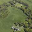 General oblique aerial view of the castle, country house and walled garden, taken from the SW.
