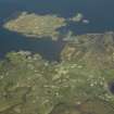 General oblique aerial view looking towards Ornsay and Ard Ghunel centred on the village with the adjacent harbour, taken from the SW.