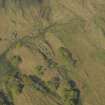 Oblique aerial view centred on the remains of the township and field banks, taken from the E.