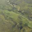 Oblique aerial view centred on the remains of the field banks and rig, taken from the NNE.