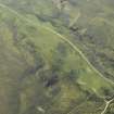 Oblique aerial view centred on the remains of the township, taken from the N.