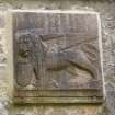 Detail of winged lion carved panel