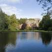 View of west wing of Fasque House, Aberdeenshire, photographed across sunken pond from NE.